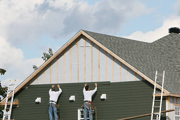 Professional Storm Damage Siding Repair technician working in Keasbey, NJ